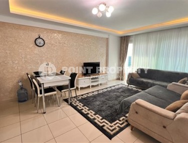 Modern furnished apartment 1+1, with a total area of 65 m2, 250 meters from the sea in the center of Mahmutlar-id-5391-photo-1