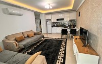 Modern furnished apartment 1+1, with a total area of 65 m2, 250 meters from the sea in the center of Mahmutlar-id-5391-photo-2
