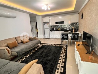 Modern furnished apartment 1+1, with a total area of 65 m2, 250 meters from the sea in the center of Mahmutlar-id-5391-photo-2