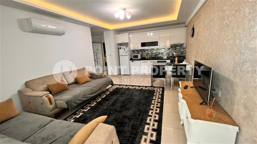 Modern furnished apartment 1+1, with a total area of 65 m2, 250 meters from the sea in the center of Mahmutlar-id-5391-photo-2