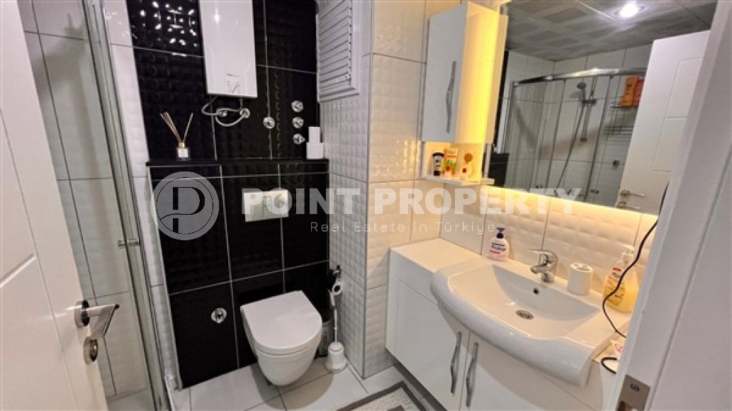 Modern furnished apartment 1+1, with a total area of 65 m2, 250 meters from the sea in the center of Mahmutlar-id-5391-photo-6