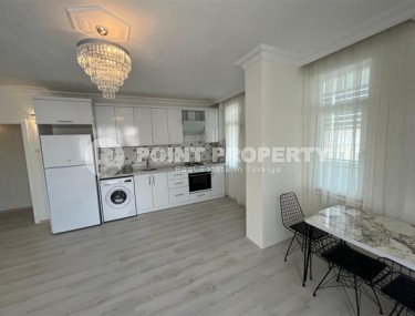 Бюджетная комфортабельная квартира 2+1 в центре района Тосмур и в 200 метрах от моря.-id-5392-фото-2