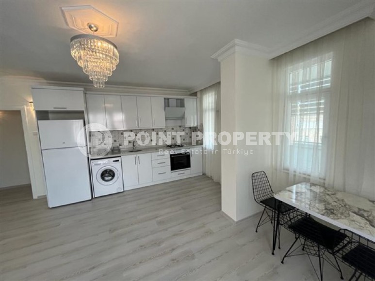 Бюджетная комфортабельная квартира 2+1 в центре района Тосмур и в 200 метрах от моря.-id-5392-фото-2