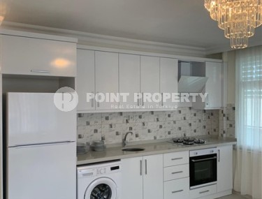 Бюджетная комфортабельная квартира 2+1 в центре района Тосмур и в 200 метрах от моря.-id-5392-фото-3