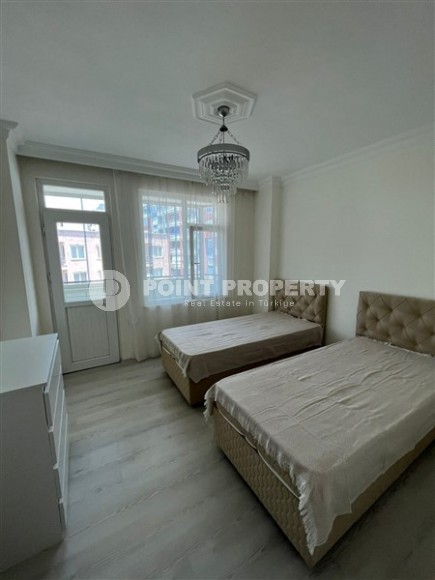 Бюджетная комфортабельная квартира 2+1 в центре района Тосмур и в 200 метрах от моря.-id-5392-фото-5