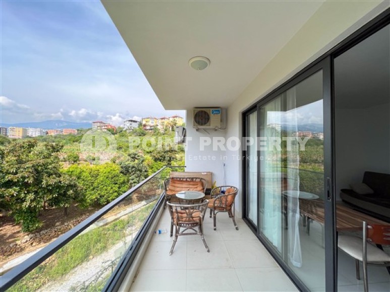 Compact cozy apartment 1+1, with a total area of 55 m2, 450 meters from the sea, in a picturesque, quiet area of Alanya - Kestel-id-5398-photo-6