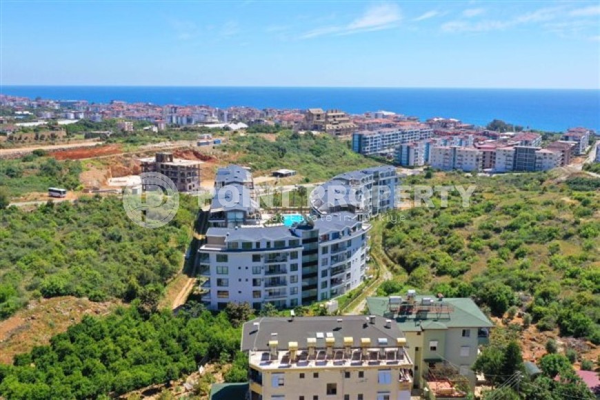 Compact cozy apartment 1+1, with a total area of 55 m2, 450 meters from the sea, in a picturesque, quiet area of Alanya - Kestel-id-5398-photo-17