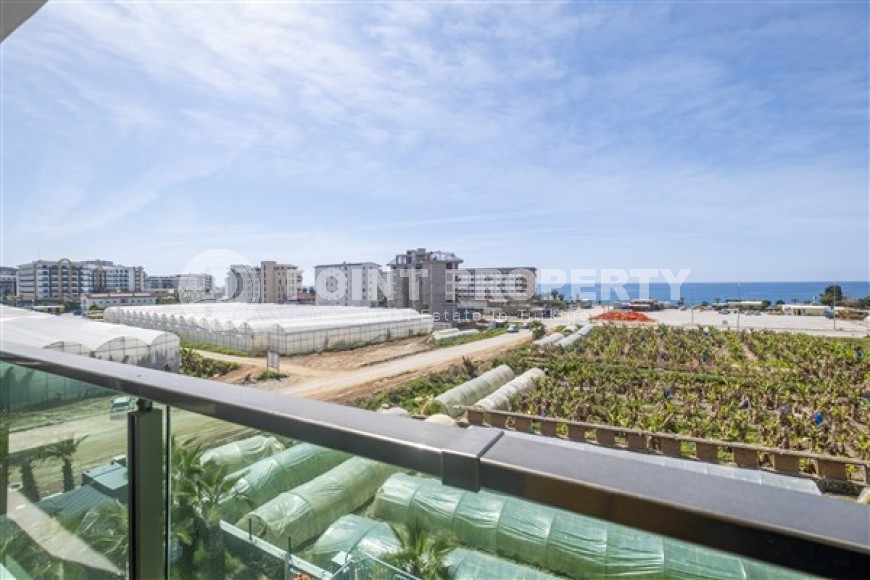 Новая квартира с видом на море в 200 метрах от пляжа в районе Каргыджак-id-5399-фото-10