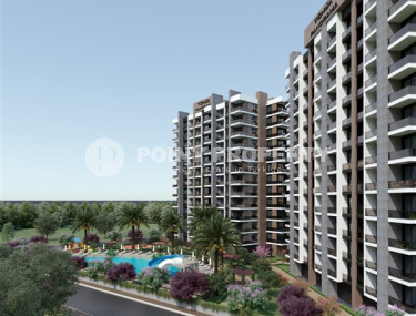 Проект на стадии строительства с квартирами 1+1 и 2+1 от 65 м2 в районе Томюк, Мерсин. Отличные цены!-id-1427-фото-2