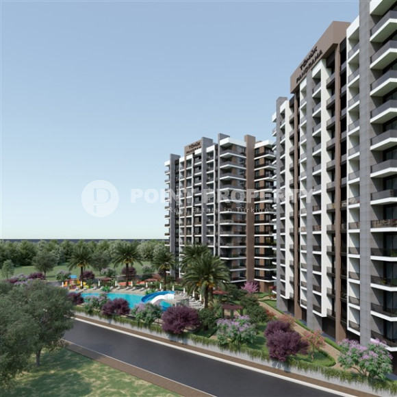 Проект на стадии строительства с квартирами 1+1 и 2+1 от 65 м2 в районе Томюк, Мерсин. Отличные цены!-id-1427-фото-2