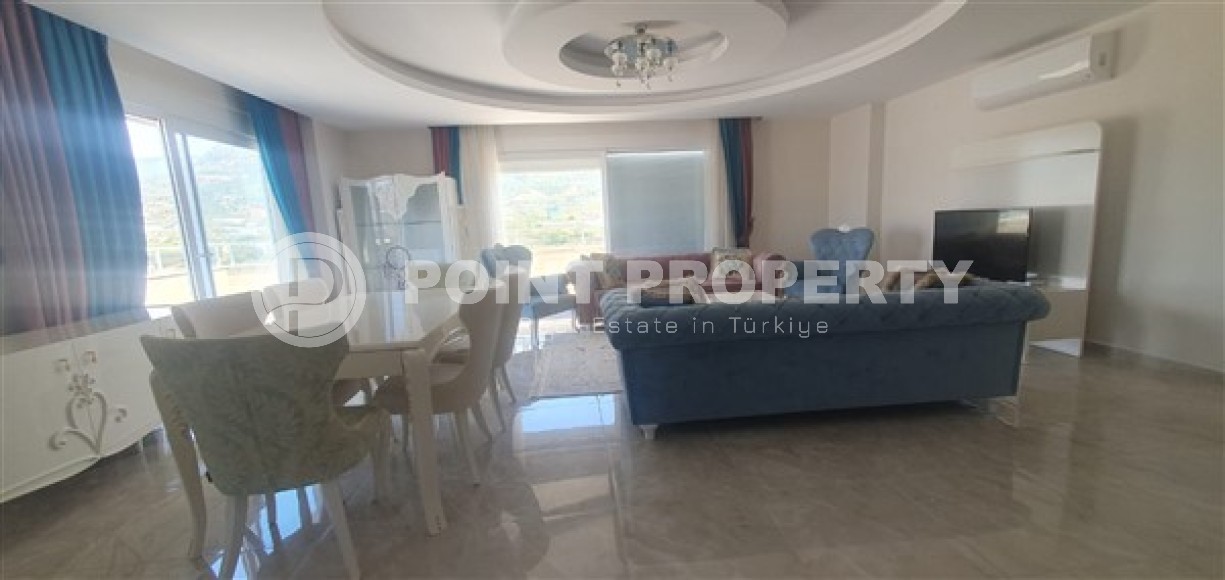 Светлые двухуровневые апартаменты с тремя спальными комнатами и видовой террасой на Торосские горы, в районе Махмутлар-id-5406-фото-3