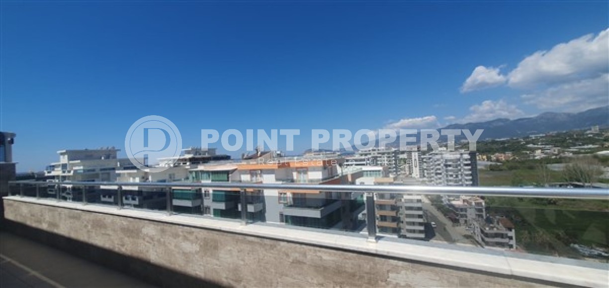 Светлые двухуровневые апартаменты с тремя спальными комнатами и видовой террасой на Торосские горы, в районе Махмутлар-id-5406-фото-8