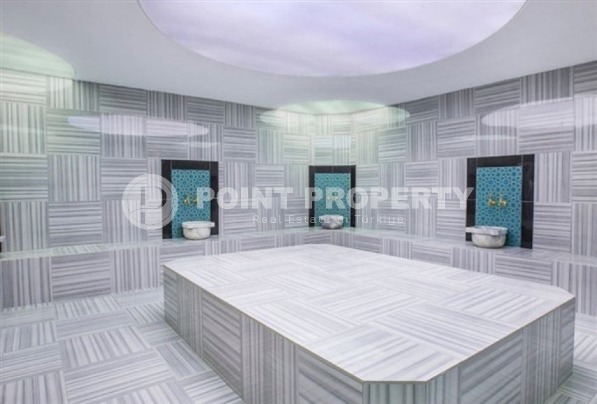 Светлые двухуровневые апартаменты с тремя спальными комнатами и видовой террасой на Торосские горы, в районе Махмутлар-id-5406-фото-10