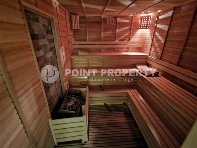 Светлые двухуровневые апартаменты с тремя спальными комнатами и видовой террасой на Торосские горы, в районе Махмутлар-id-5406-фото-11