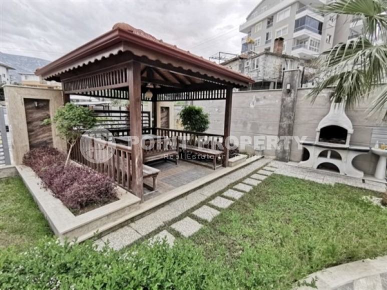 Светлые двухуровневые апартаменты с тремя спальными комнатами и видовой террасой на Торосские горы, в районе Махмутлар-id-5406-фото-14