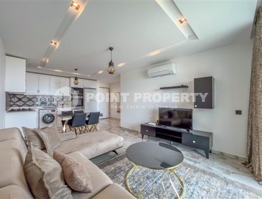 Stylish furnished apartments, 1+1 layout, near the sea in the Kargicak area-id-5411-photo-1