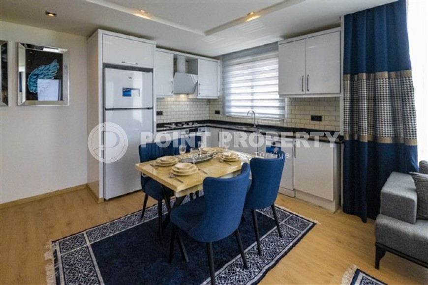 Современные меблированные апартаменты с двумя спальными комнатами, рядом с морем, в районе города Аланья - Каргыджак-id-5415-фото-2