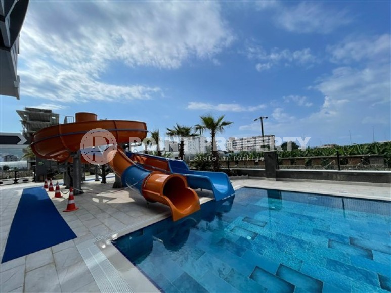 Современные меблированные апартаменты с двумя спальными комнатами, рядом с морем, в районе города Аланья - Каргыджак-id-5415-фото-18