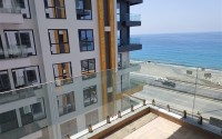 Spacious 4+1 apartment with a total area of 200 m2, on the first line from the sea in the center of Mahmutlar-id-5419-photo-2