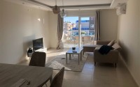 Panoramic apartment 1+1, with a total area of 70 m2, on the 11th floor in the center of Mahmutlar district-id-5422-photo-1