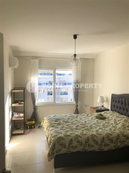 Panoramic apartment 1+1, with a total area of 70 m2, on the 11th floor in the center of Mahmutlar district-id-5422-photo-3