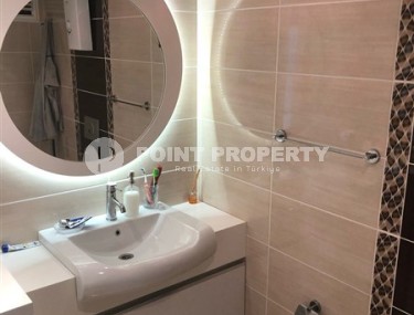 Панорамная квартира 1+1, общей площадью 70 м2, на 11-м этаже в центре района Махмутлар-id-5422-фото-4