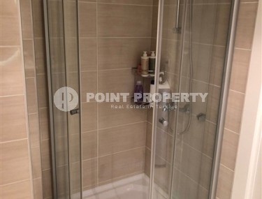 Панорамная квартира 1+1, общей площадью 70 м2, на 11-м этаже в центре района Махмутлар-id-5422-фото-5