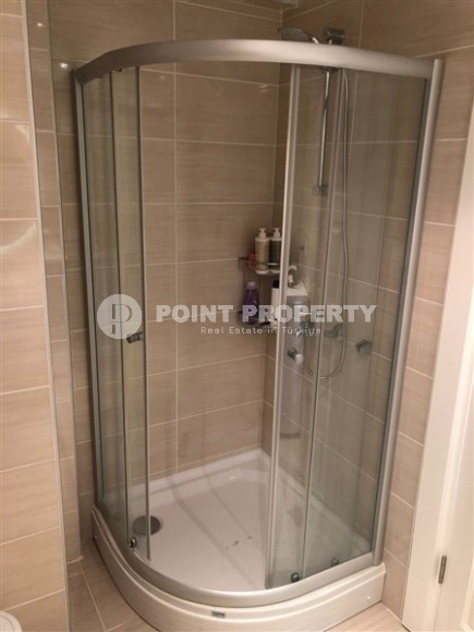 Panoramic apartment 1+1, with a total area of 70 m2, on the 11th floor in the center of Mahmutlar district-id-5422-photo-5