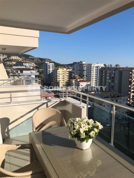 Panoramic apartment 1+1, with a total area of 70 m2, on the 11th floor in the center of Mahmutlar district-id-5422-photo-6