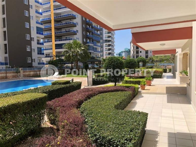 Panoramic apartment 1+1, with a total area of 70 m2, on the 11th floor in the center of Mahmutlar district-id-5422-photo-13