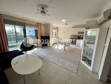 Spacious 2+1 apartment with a total area of 100 m2, 100 meters from the sea and the center of the popular area of Alanya - Mahmutlar-id-5427-photo-2
