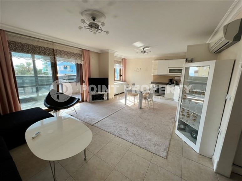 Spacious 2+1 apartment with a total area of 100 m2, 100 meters from the sea and the center of the popular area of Alanya - Mahmutlar-id-5427-photo-2