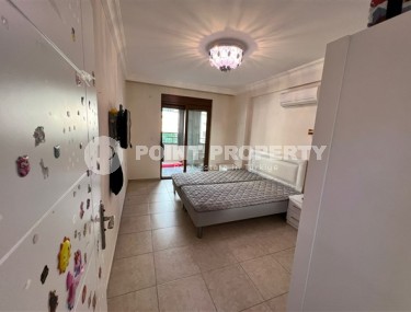 Spacious 2+1 apartment with a total area of 100 m2, 100 meters from the sea and the center of the popular area of Alanya - Mahmutlar-id-5427-photo-4