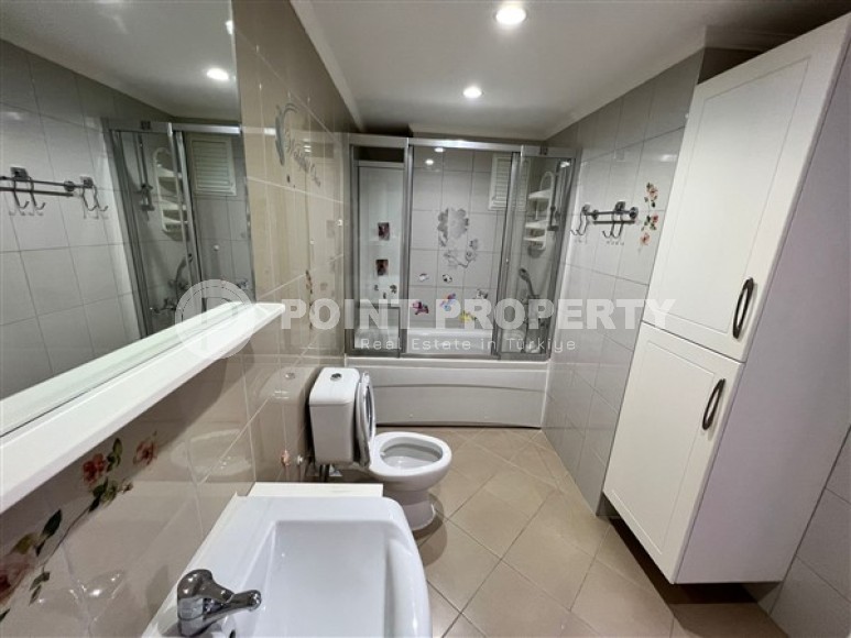 Spacious 2+1 apartment with a total area of 100 m2, 100 meters from the sea and the center of the popular area of Alanya - Mahmutlar-id-5427-photo-8