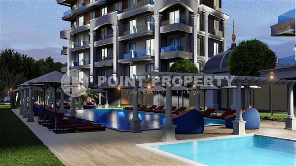 Апартаменты планировками 1+1, дуплексы 2+1 в жилом комплексе на завершающем этапе строительства, в районе города Аланья - Тюрклер-id-5429-фото-15