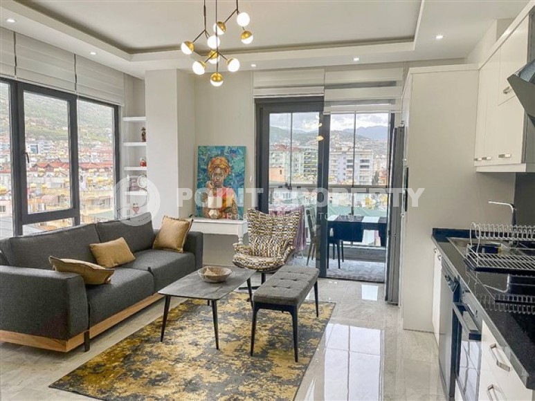 Stylish new 1+1 apartment with a total area of 56 m2, 500 meters from the beach in the center of Alanya-id-5438-photo-1