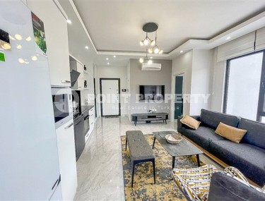 Стильная новая квартира 1+1, общей площадью 56 м2, в 500 метрах от пляжа в центре Аланьи-id-5438-фото-2