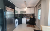 Furnished apartment 1+1, 60m², in an urban building in the very center of Alanya-id-1430-photo-6