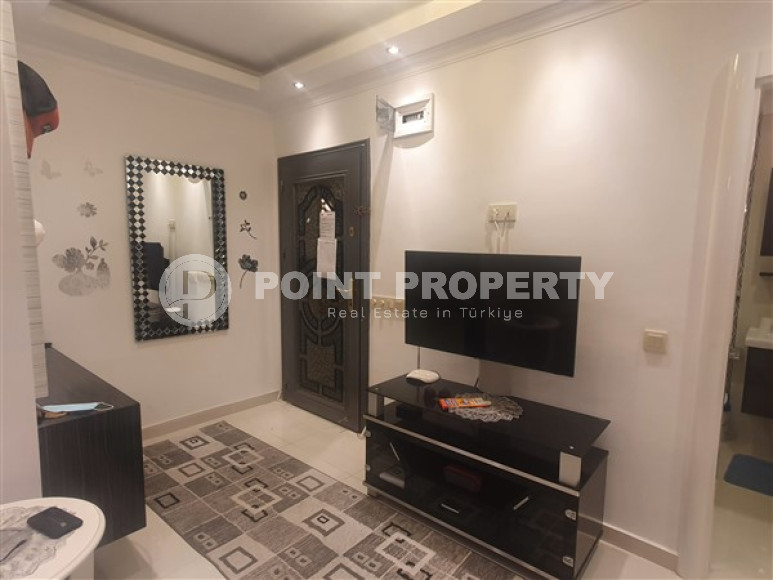 Furnished apartment 1+1, 60m², in an urban building in the very center of Alanya-id-1430-photo-8
