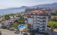 Spacious two-level apartment, 3+1 layout, overlooking the Mediterranean Sea, in the Kestel area-id-5454-photo-40