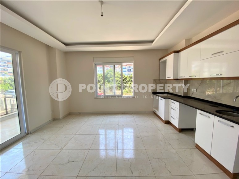 Unfurnished apartment with two bedrooms, in one of the best areas of Alanya - lower Oba-id-5456-photo-6