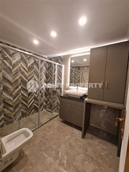 Стильная современная квартира 2+1, с новой мебелью и бытовой техникой, в самом центре Аланьи-id-5467-фото-28