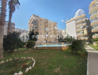 Partially furnished apartment with three bedrooms, in a well-maintained residential complex on the first coastline from the Mediterranean Sea, in the Mahmutlar area-id-5478-photo-1