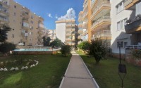Partially furnished apartment with three bedrooms, in a well-maintained residential complex on the first coastline from the Mediterranean Sea, in the Mahmutlar area-id-5478-photo-21