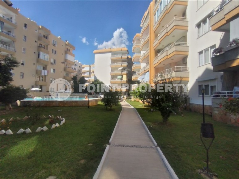 Partially furnished apartment with three bedrooms, in a well-maintained residential complex on the first coastline from the Mediterranean Sea, in the Mahmutlar area-id-5478-photo-21