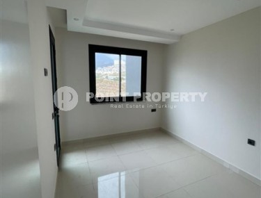 Небольшие апартаменты в чистовой отделке, планировкой 1+1, в районе Махмутлар-id-5485-фото-4