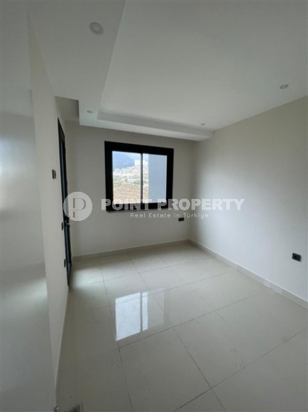 Небольшие апартаменты в чистовой отделке, планировкой 1+1, в районе Махмутлар-id-5485-фото-4