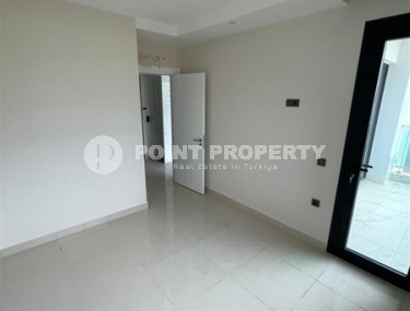 Небольшие апартаменты в чистовой отделке, планировкой 1+1, в районе Махмутлар-id-5485-фото-5