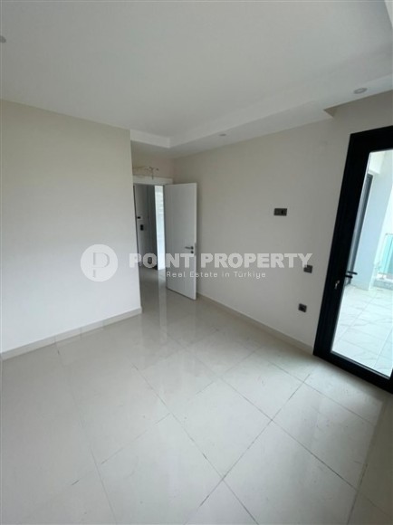 Небольшие апартаменты в чистовой отделке, планировкой 1+1, в районе Махмутлар-id-5485-фото-5