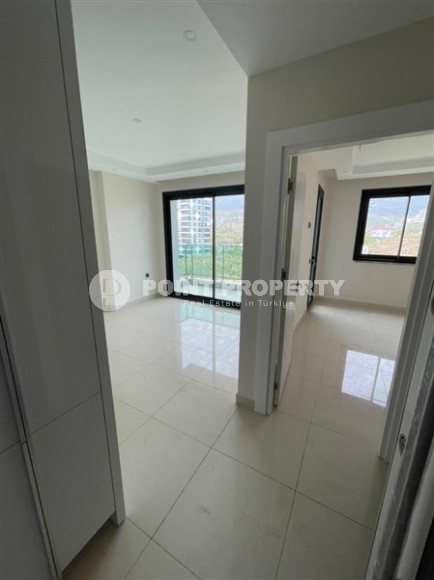 Небольшие апартаменты в чистовой отделке, планировкой 1+1, в районе Махмутлар-id-5485-фото-7